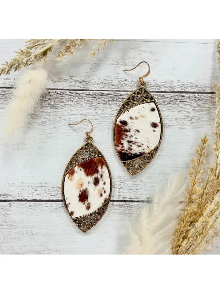 Cowhide Serenade: Gilded Gold Scroll Earrings with A Twist